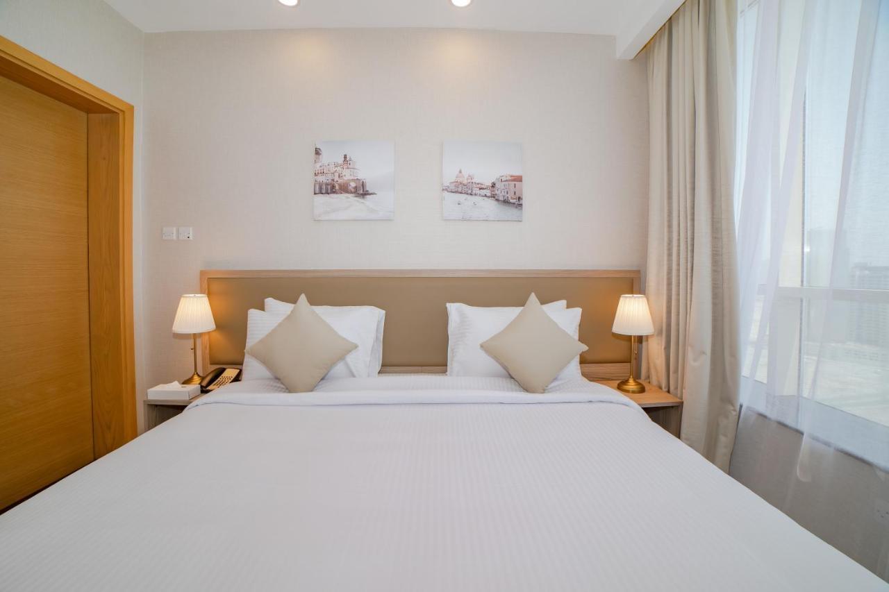 Platinum Coast Hotel Apartments Fudżajra Zewnętrze zdjęcie A bedroom at the hotel