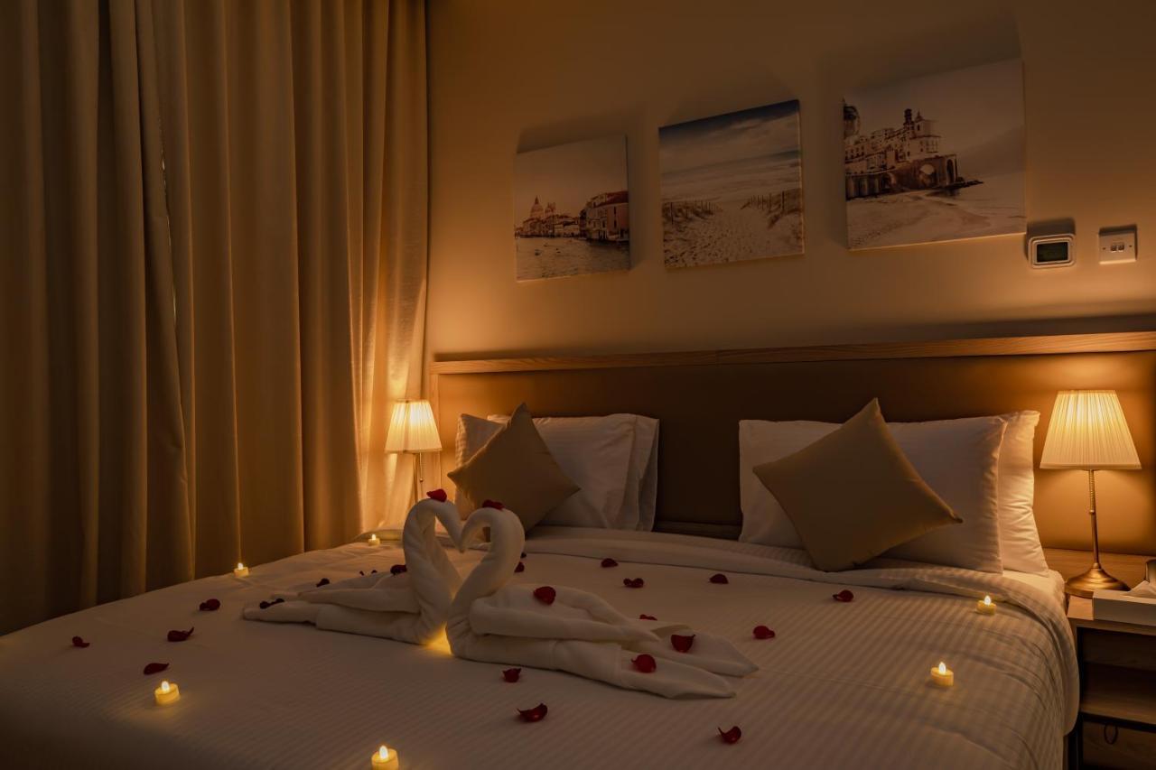 Platinum Coast Hotel Apartments Fudżajra Zewnętrze zdjęcie A bedroom at the hotel